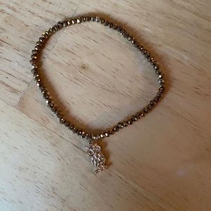 Gold beaded bracelet with Owl pendant